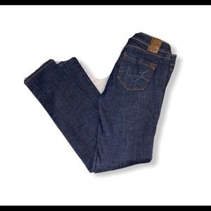 Fragile skinny blue jeans